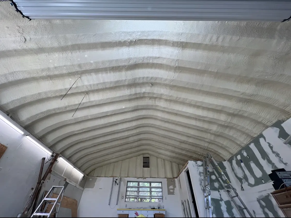 Spray polyurethane foam applied to the underside of a metal roof deck in Northampton